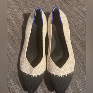 Rothy's The Point II flats in a cream herringbone pattern with a black cap